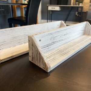 Two rustic wood shelves