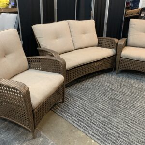 Brown resin wicker love seat and two chairs with Beige cushions