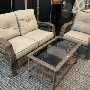 Brown resin wicker chair, love seat and glass top coffee table with grey cushions