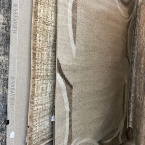 Paco Home Sinai abstract 5’3x7’3 area rug in brown tones.